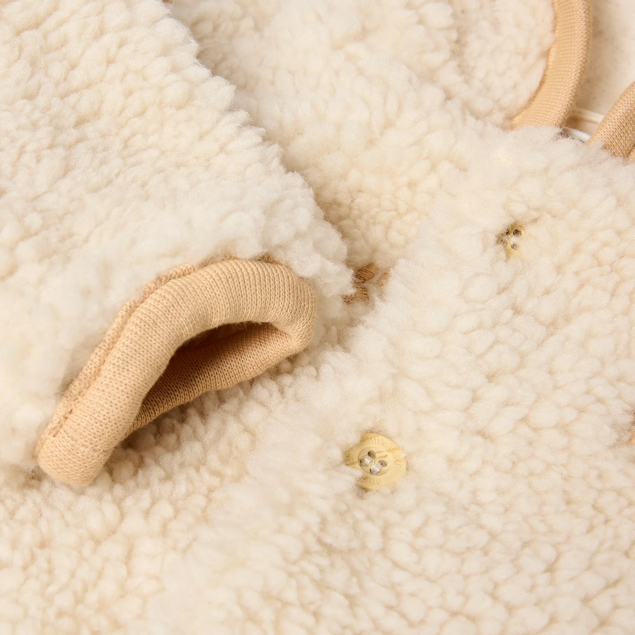 Casaco Teddy com estampa de pata de areia